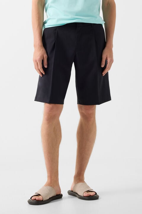 Johny pleated shorts in Navy blue